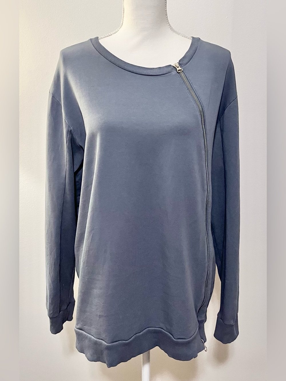 Universal Standard Meridian Asymmetrical Zip Sweatshirt in Slate Blue. Size M